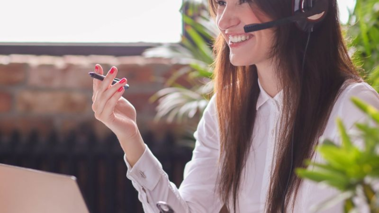 Woman working in call center as dispatcher